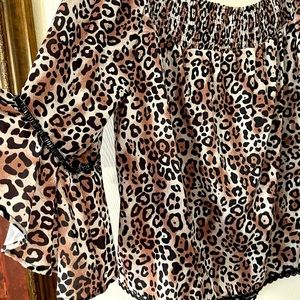 Leopard print off the shoulder blouse